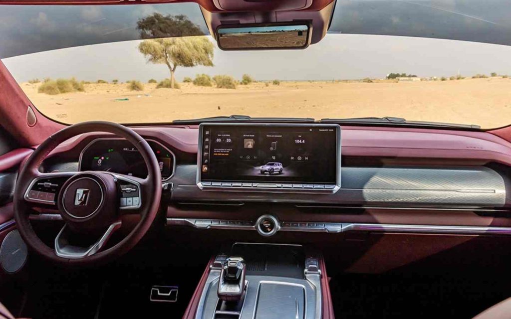 The model features a wide infotainment screen