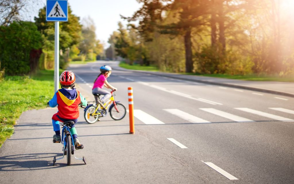 Children should wear helmets, use bike lanes, signal turns and follow traffic rules