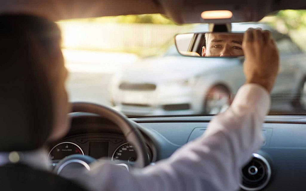 checking mirrors for RTA driving test in Dubai