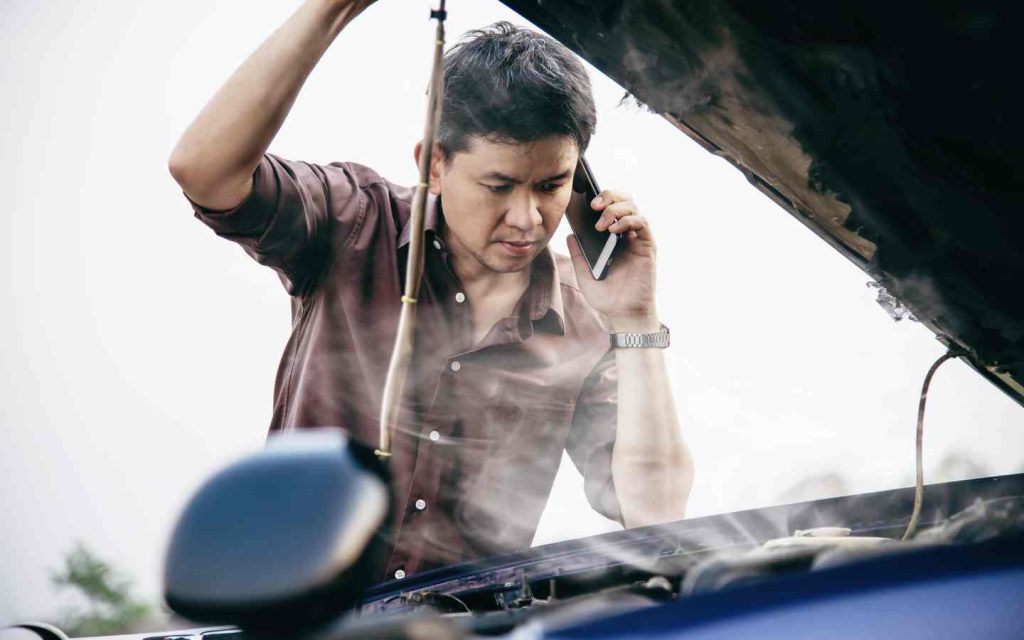Smoke Coming From Under the Hood can be because of heating engine parts