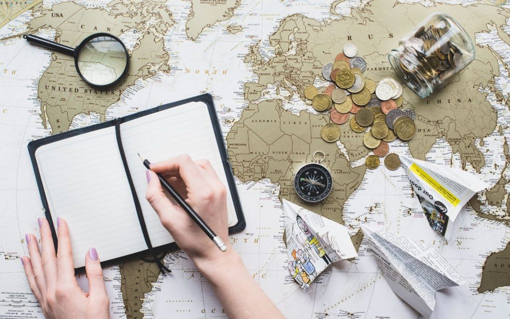 A tourist calculating travel budget 