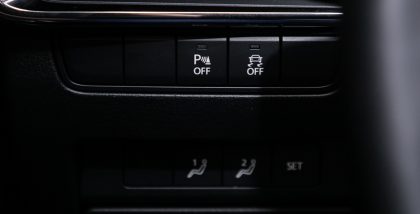 زر التحكم الديناميكي بالثبات في السيارة