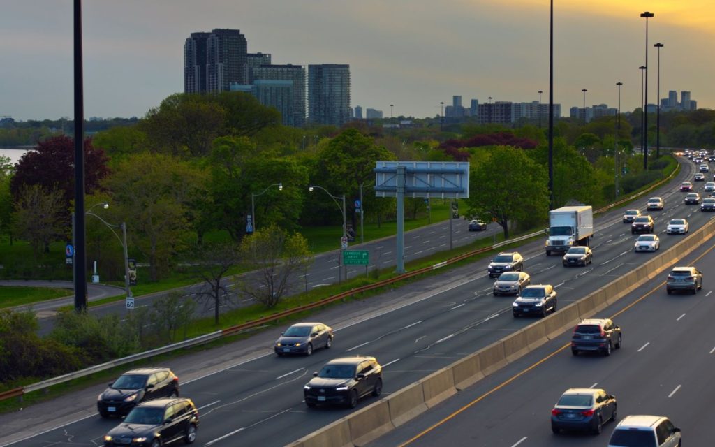 Cars moving along the busy road