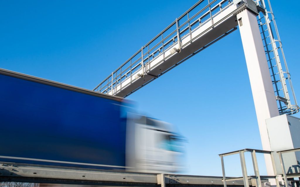 Truck crossing through a toll gate