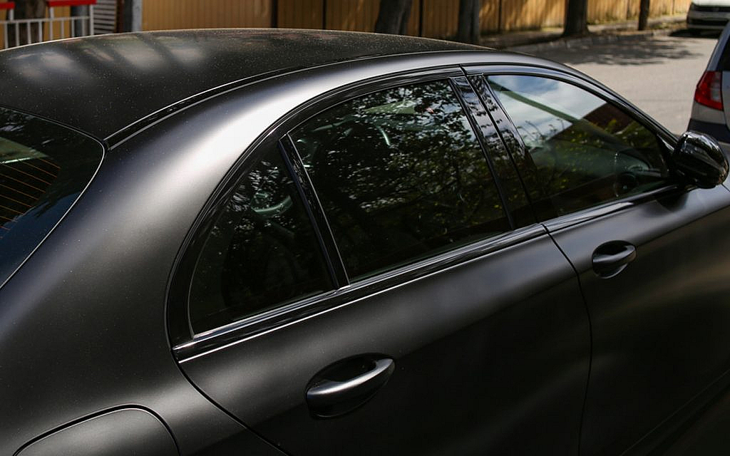 A closeup of a sedan car