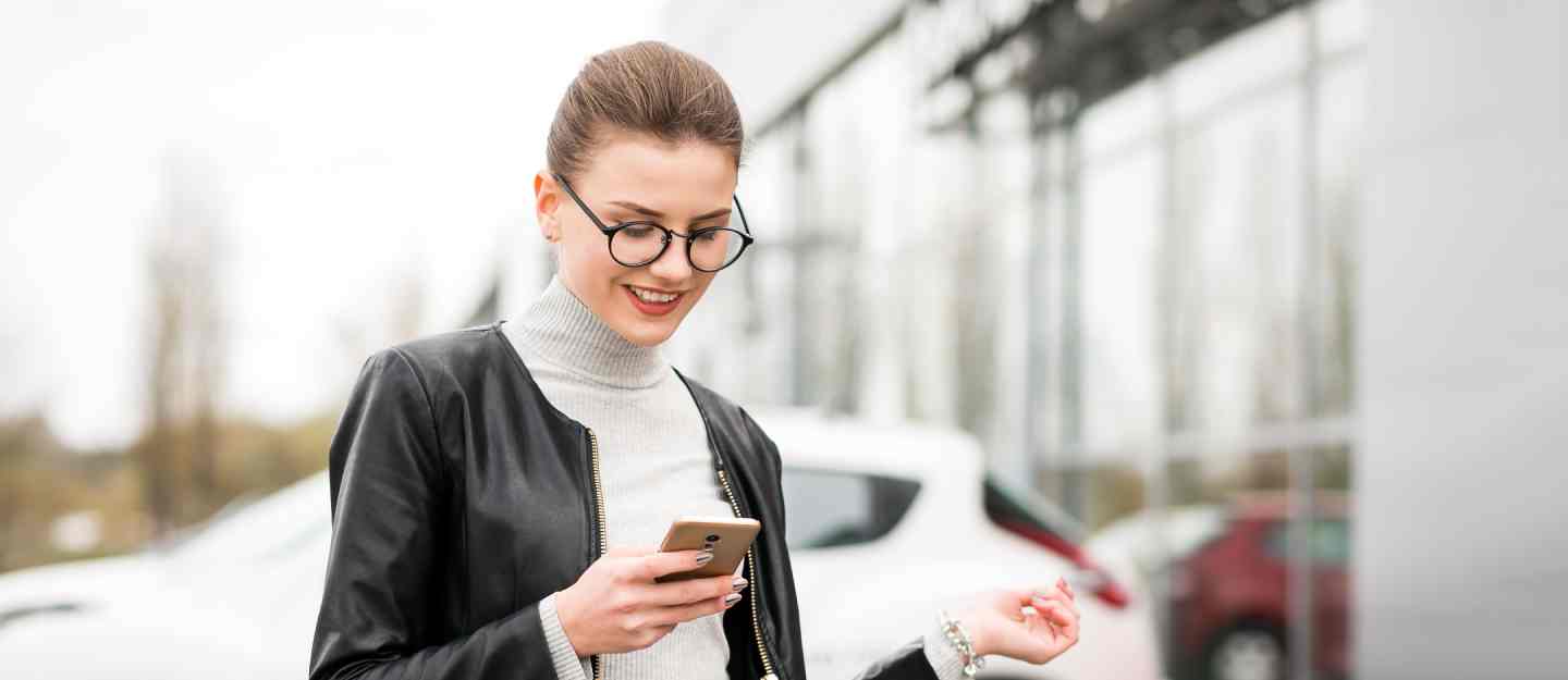 woman using digital valet parking payment service