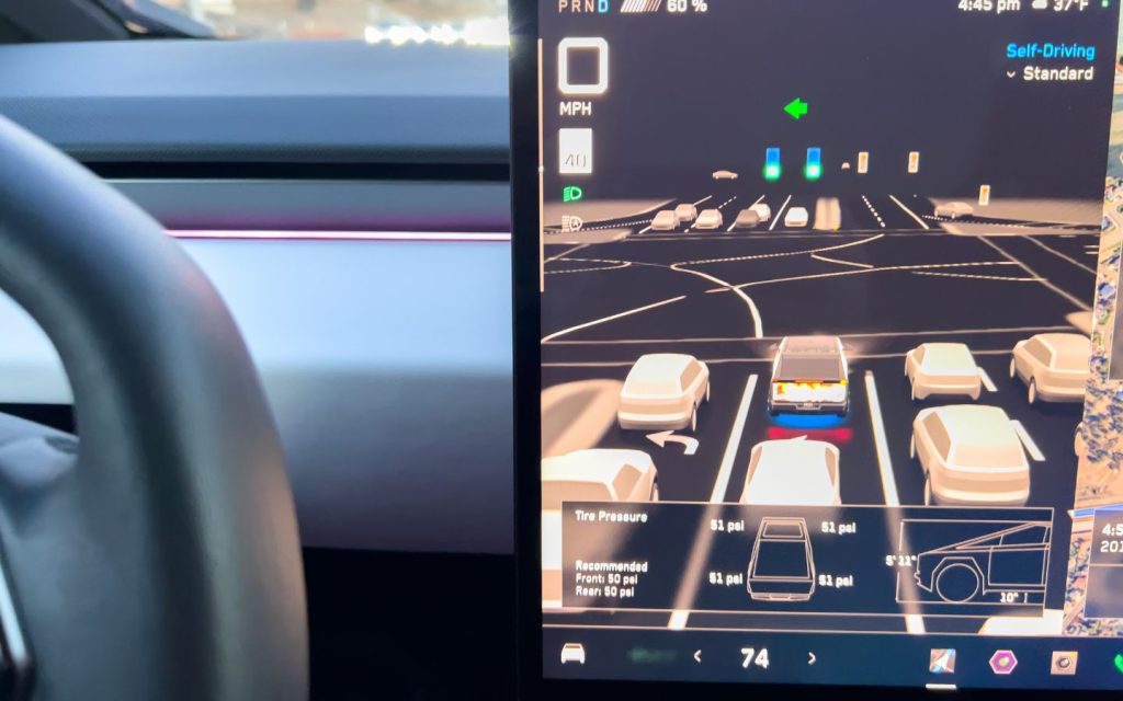 man driving an electric vehicle 