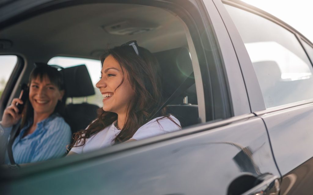 Women enjoying a road trip