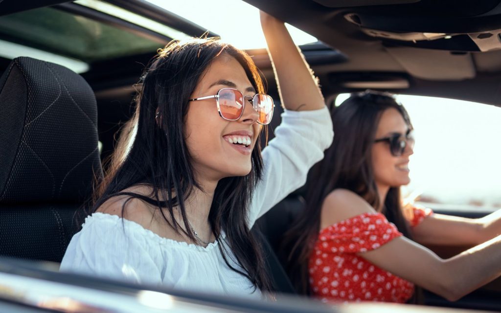 Women enjoying a road trip