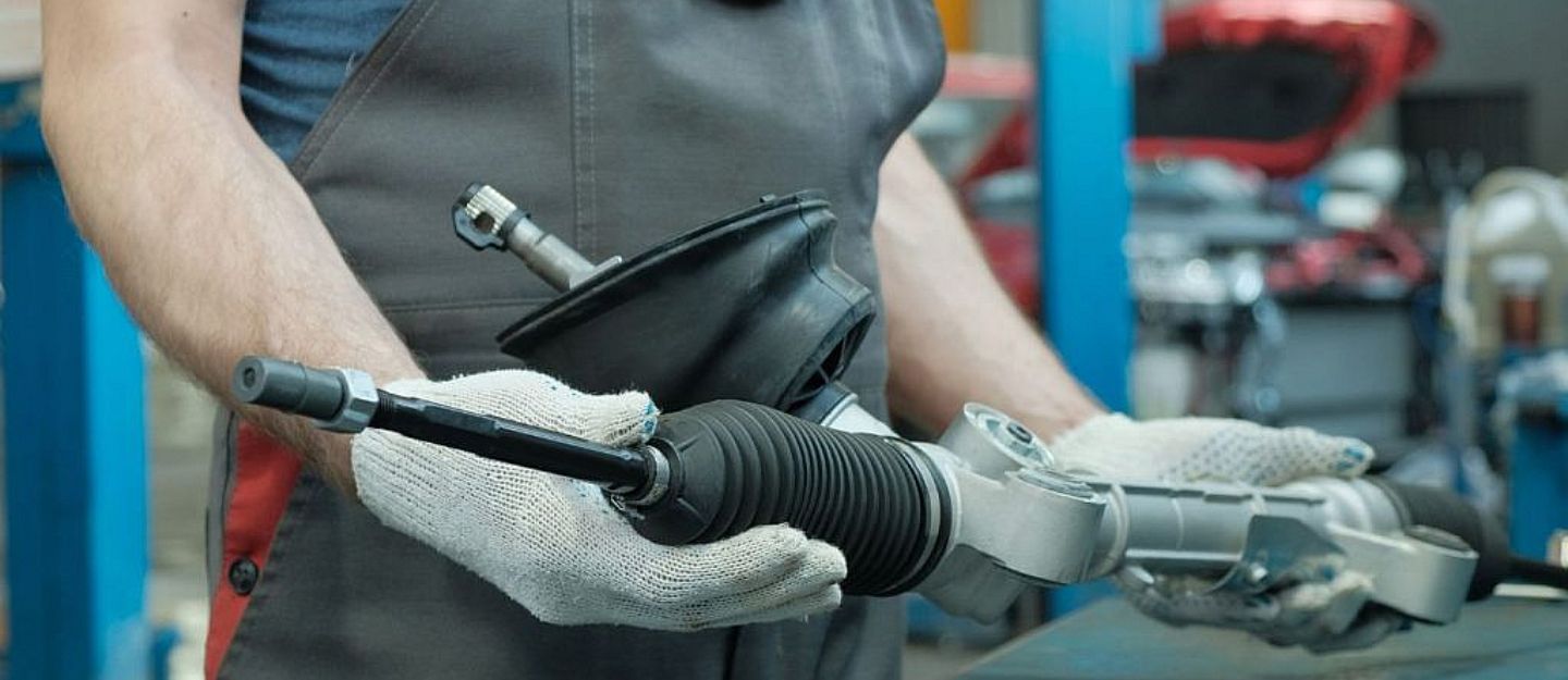 a man holding Electro-hydraulic power steering