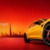 A car with Dubai skyline in the background for UAE Auto News Round Up