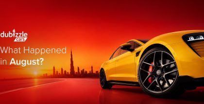 A car with Dubai skyline in the background for UAE Auto News Round Up